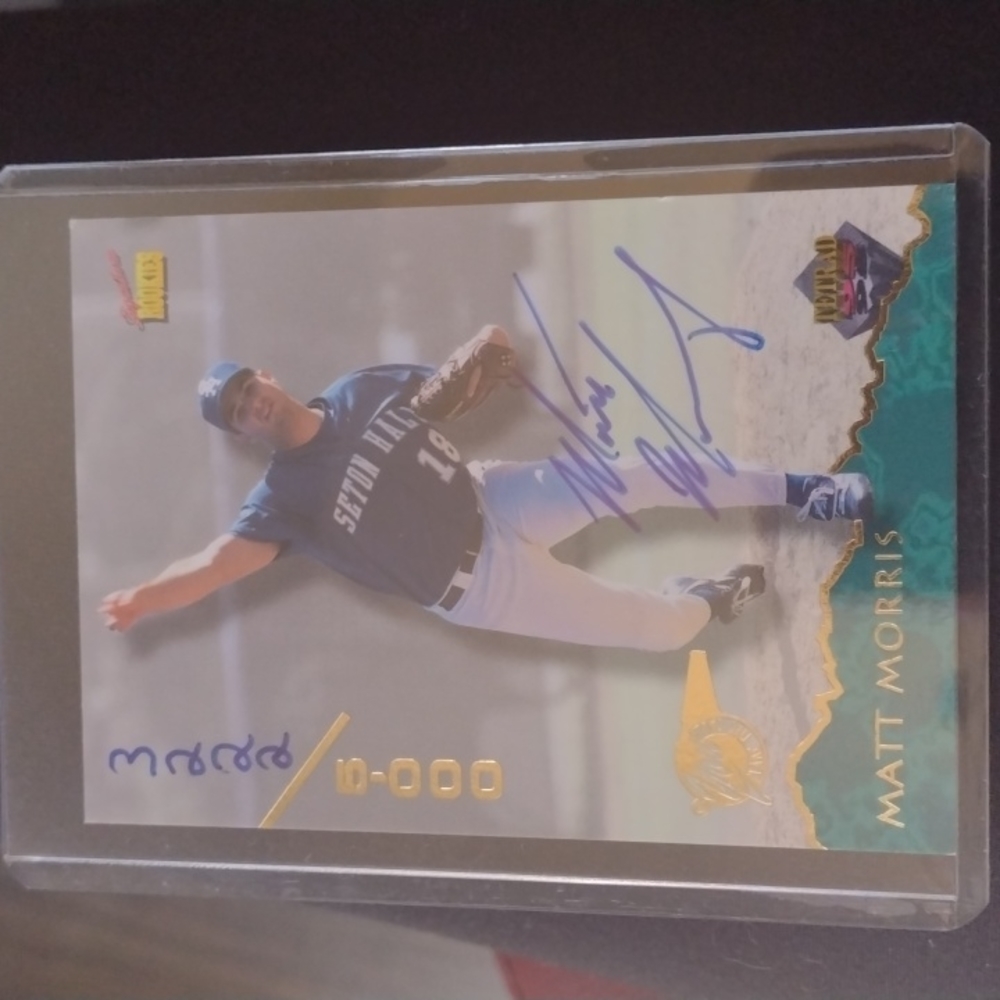 Matt Morris autographed baseball card in protective cover.
